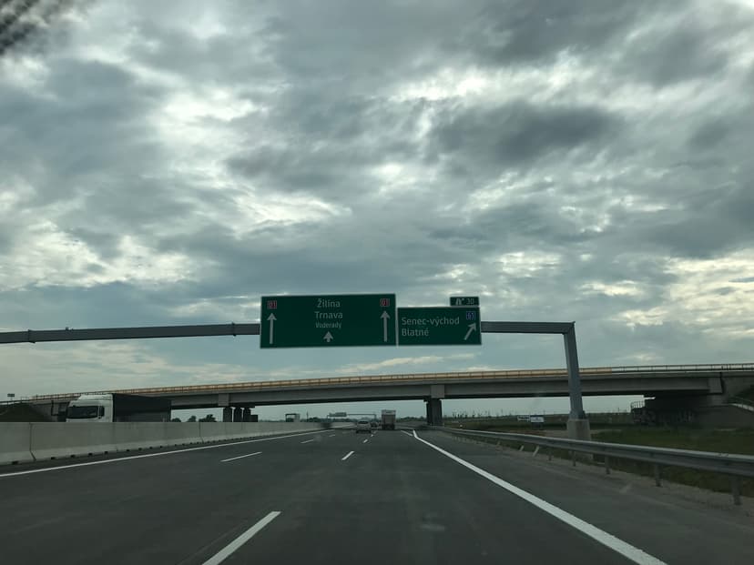 signs above the D1 highway near Senec — directions Žilina, Trnava and the Senec-východ exit